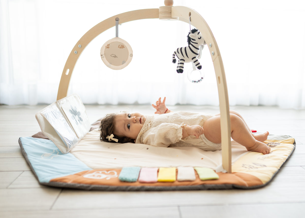 Baby playing at the Tiny Legends gym